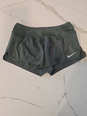 Nike Women’s Dark Green Athletic Running Shorts with Reflective Swoosh